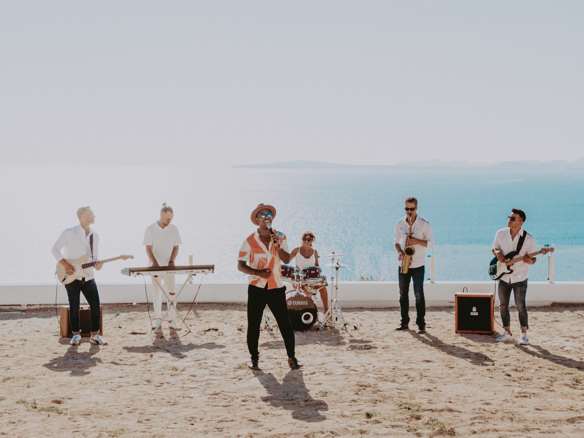 Party Band Mallorca — the full band performing by the sea on Mallorca